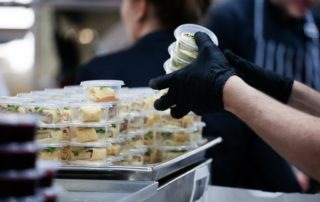 Preparing to go food in commercial kitchen